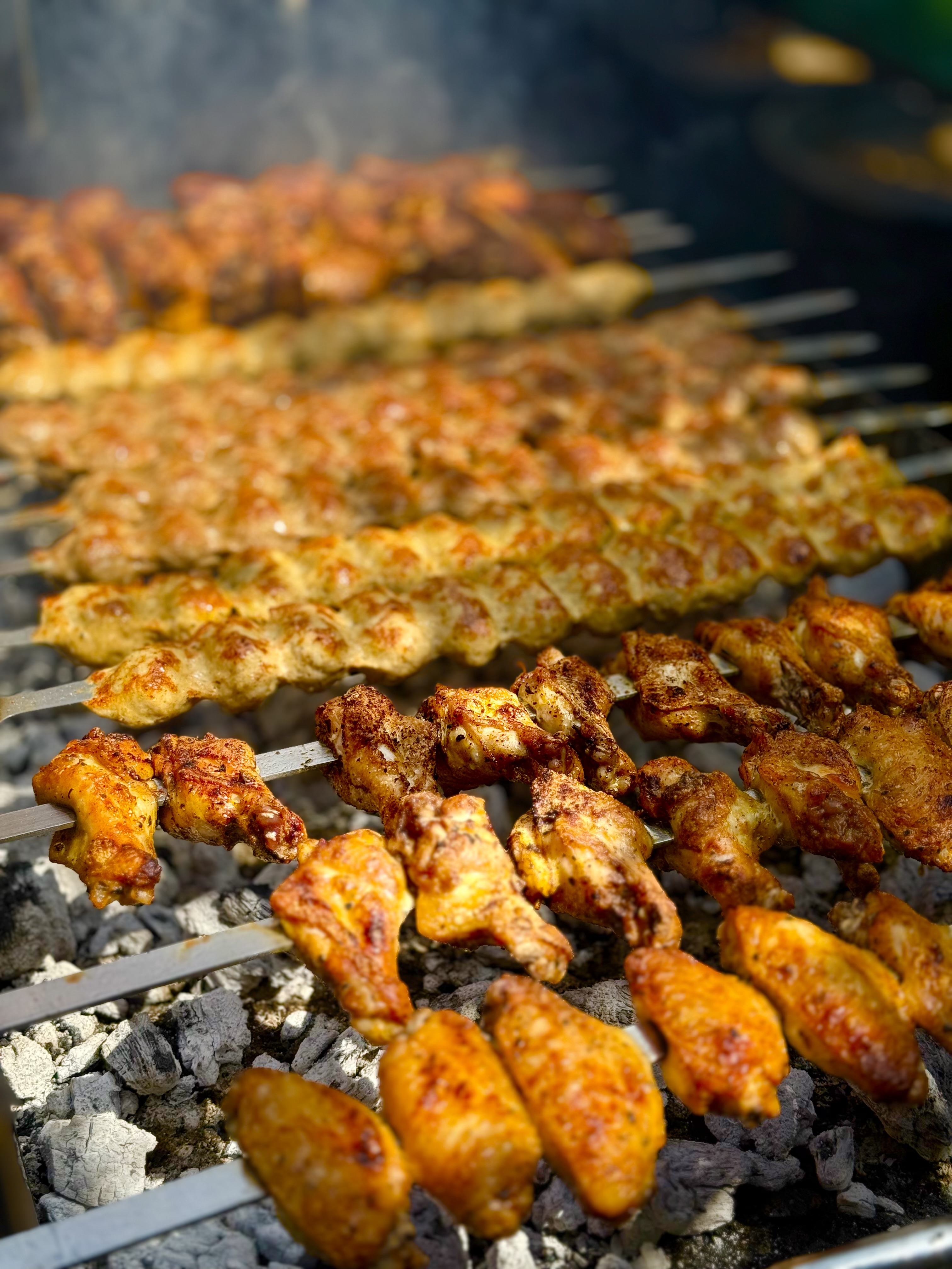 Charcoal grill. Kebabs and skewers over charcoal grill.